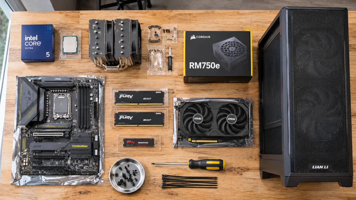 Componentes del PC sobre la mesa: Intel Core Ultra 5 245K, placa MSI Z890 Tomahawk, RAM Kingston Fury Beast DDR5, RTX 5060 Ti, fuente Corsair RM750e y caja Lian Li Lancool 217